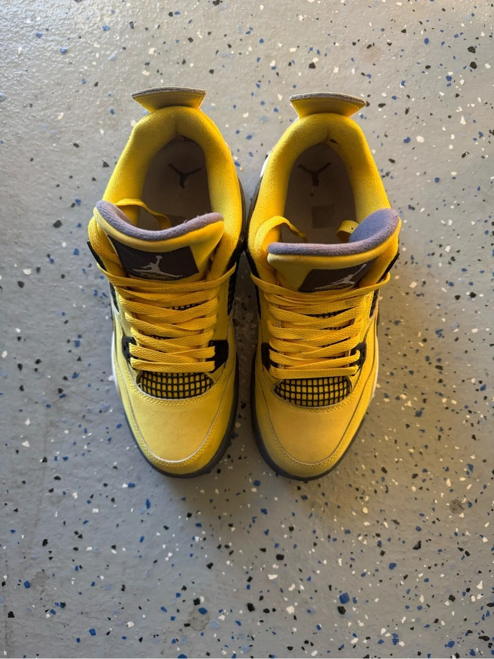 Jordan Yellow and Black Retro 4 Sneakers “Yellow Lightning”